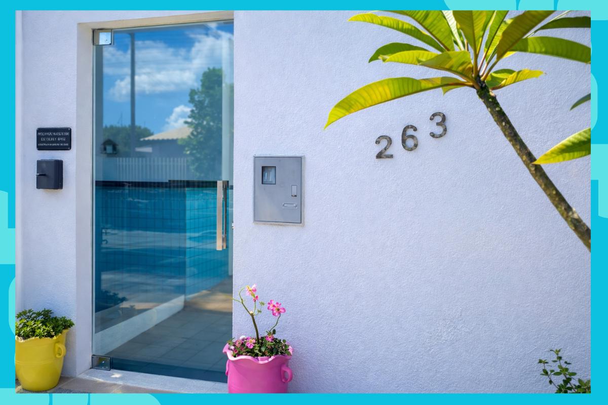 Entrada da Pousada Miss Roses